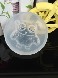 Silicone mold detail showing the clear owl pattern and shape for DIY crafts and jewelry making.