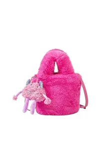 Pink fluffy plush bucket bag with cute monster charm, stylish autumn winter shoulder bag.