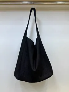 Winter black large capacity slouchy shoulder tote bag for women daily commuting style.