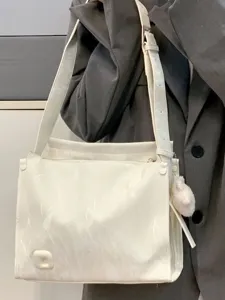 Stylish white large capacity tote shoulder bag casual commuter crossbody bag with plush charm.
