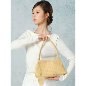 Woven leather underarm shoulder bag detail, stylish french style casual handbag for women.