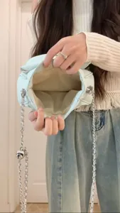 Light blue cloud pleated shoulder bag detail view, stylish casual crossbody bag for women
