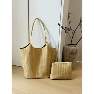 Beige woven leather tote bag set with matching pouch, stylish large capacity commuting bag.