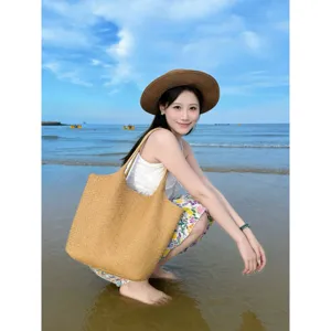 Large capacity woven tote bag, stylish leather intrecciato design for travel, vacation and daily commuting use.