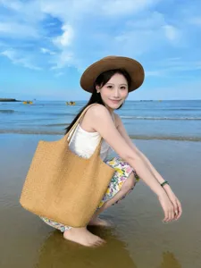 Large woven tote bag for women, stylish beach vacation shoulder bag, casual commuting handbag.