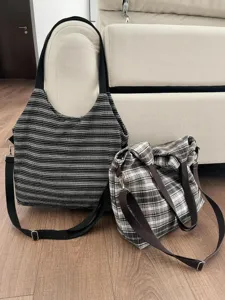 Detail shot of retro canvas shoulder bags featuring classic stripe and plaid patterns.