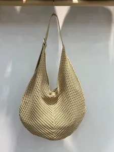 Beige hollow-out woven shoulder bag, casual summer beach hobo bag with leather strap.