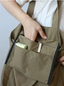 Japanese retro waterproof nylon tote bag, large capacity casual shoulder bag for daily travel.