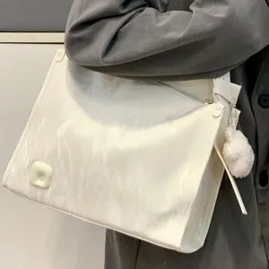 Stylish large white shoulder bag, casual commuting tote and versatile crossbody bag for women.