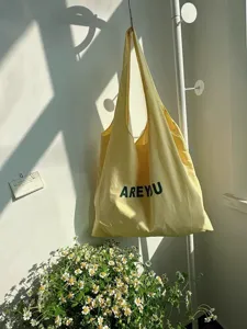 Borsa shopper in tela gialla da donna, grande borsa a spalla casual per il lavoro quotidiano.