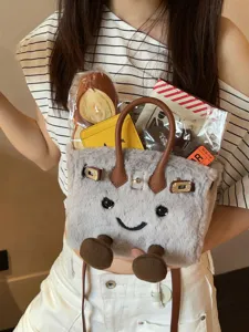 Cute plush crossbody bag with cartoon smile design, fuzzy grey tote handbag for autumn daily use.