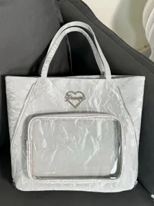 Large capacity ripple ita bag with clear front pocket and heart metal charm for daily fashion use.