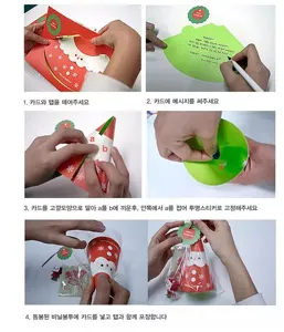 Set de tarjetas de felicitación navideñas DIY con diseño de papá Noel y bolsa de regalo.