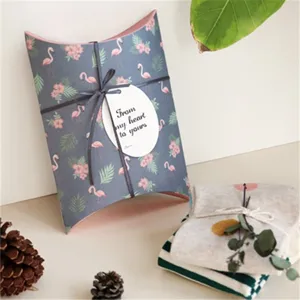 Vintage flamingo floral pillow gift box with ribbon for party favors and celebrations.
