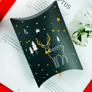 Christmas deer pillow box black gold gift packaging for candy, nougat, and sweet holiday treats.