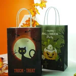 Halloween paper gift bags detail shot, featuring cute cat and pumpkin designs for parties.