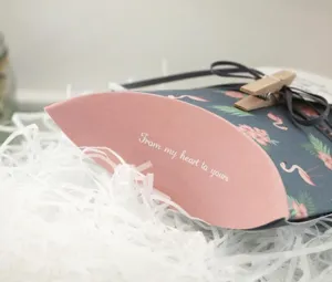 Elegant pillow gift box with floral flamingo print, perfect for wedding candy favors.