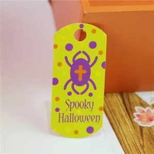 Halloween paper hanging tag with spooky spider design and polka dots for party decoration view