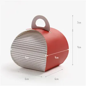 Red striped paper pillow gift box, creative packaging for cookies, candy, and apple gifts.