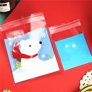 Sacchetti di plastica trasparenti adesivi natalizi con simpatiche carte orso polare per regali.