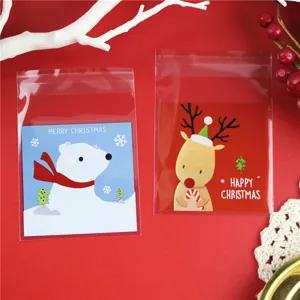 Sacchetti regalo adesivi natalizi per biscotti e caramelle con simpatici disegni di animali.