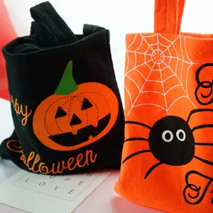 Halloween felt candy tote bags set, black pumpkin and orange spider designs for kids.