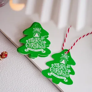 Green Christmas tree shaped paper hang tags with red white string for gift decoration