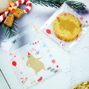 Detailed view of Christmas bear self-adhesive cookie bags, clear packaging for cookies.