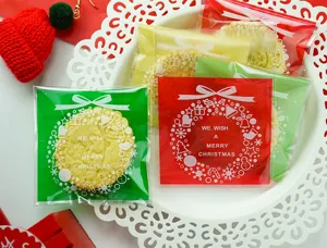 Christmas self-adhesive plastic packaging bags for cookies, soaps, and festive gifts.