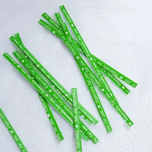 Green paper twist ties with white Especially for you text for gift packaging and sealing.