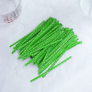 Close-up detail of green paper twist ties with white especially for you print for gift packaging