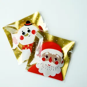 Christmas golden self-adhesive bags with cute snowman and Santa designs for candy and cookies.