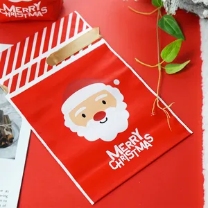 Close-up detail of the Christmas Santa Claus printed packaging bag with festive red design.