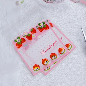 Cute strawberry cartoon transparent self adhesive gift bags candy packaging details view.