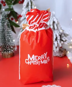 Christmas red drawstring gift bag detail view, plastic candy and biscuit packaging pouch.