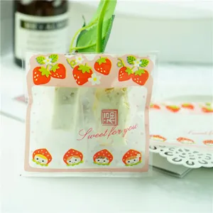 Cute strawberry red riding hood self adhesive candy packaging bag for gift wrapping.