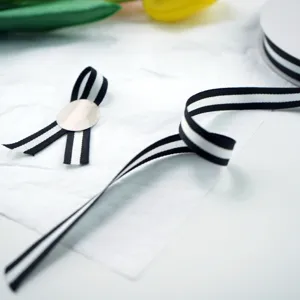Black and white striped ribbon detail, perfect for gift wrapping, cake boxes, and DIY crafts.