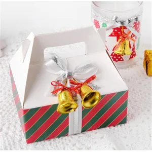 Christmas gift box with handle red green stripes white ribbon and gold bells festive packaging