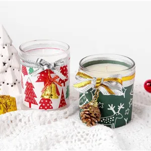 Christmas scented candle decor with reindeer and tree print and silver bow ribbon