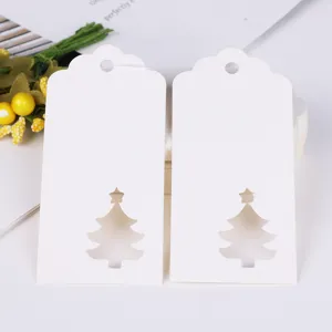 Detailed view of hollow Christmas tree paper tags for DIY holiday gifts and party decor.