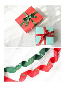 Christmas ribbon detail showing red and green grosgrain ribbons with festive trees and text.