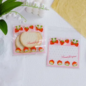 Cute strawberry self-adhesive cookie packaging bags, transparent candy gift treat bags.