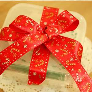 Weihnachten 1,5 cm breites rotes Band mit goldenem Zuckerstangen-Print fuer Geschenke.