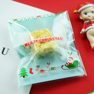 Bolsa de galletas de Navidad trineo azul caramelo regalo paquete plástico transparente 100pcs