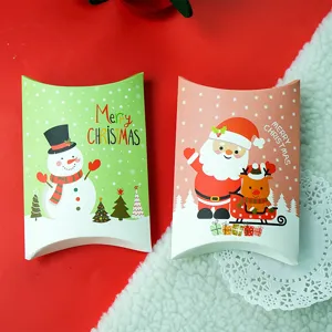 Christmas pillow candy gift box set, festive paper packaging for holiday treats and parties.