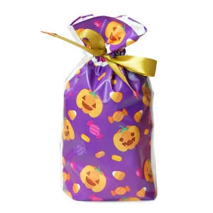 Bolsa de regalo de Halloween para caramelos con cinta dorada, ideal para fiestas.