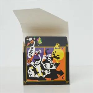 Halloween theme paper gift box detail, featuring cute ghost and pumpkin graphic print design.