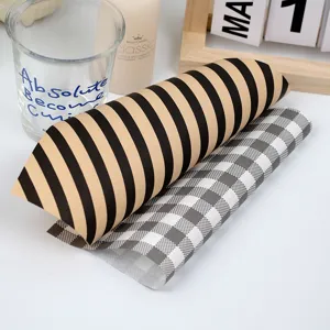 Greaseproof baking paper details showing chic diagonal stripes and checkerboard patterns for food.