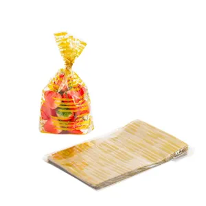 Bolsas de plástico transparentes para alimentos con elegantes rayas doradas para galletas.
