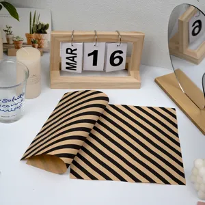 Close-up detail of black and brown striped greaseproof paper used for baking and food packaging.